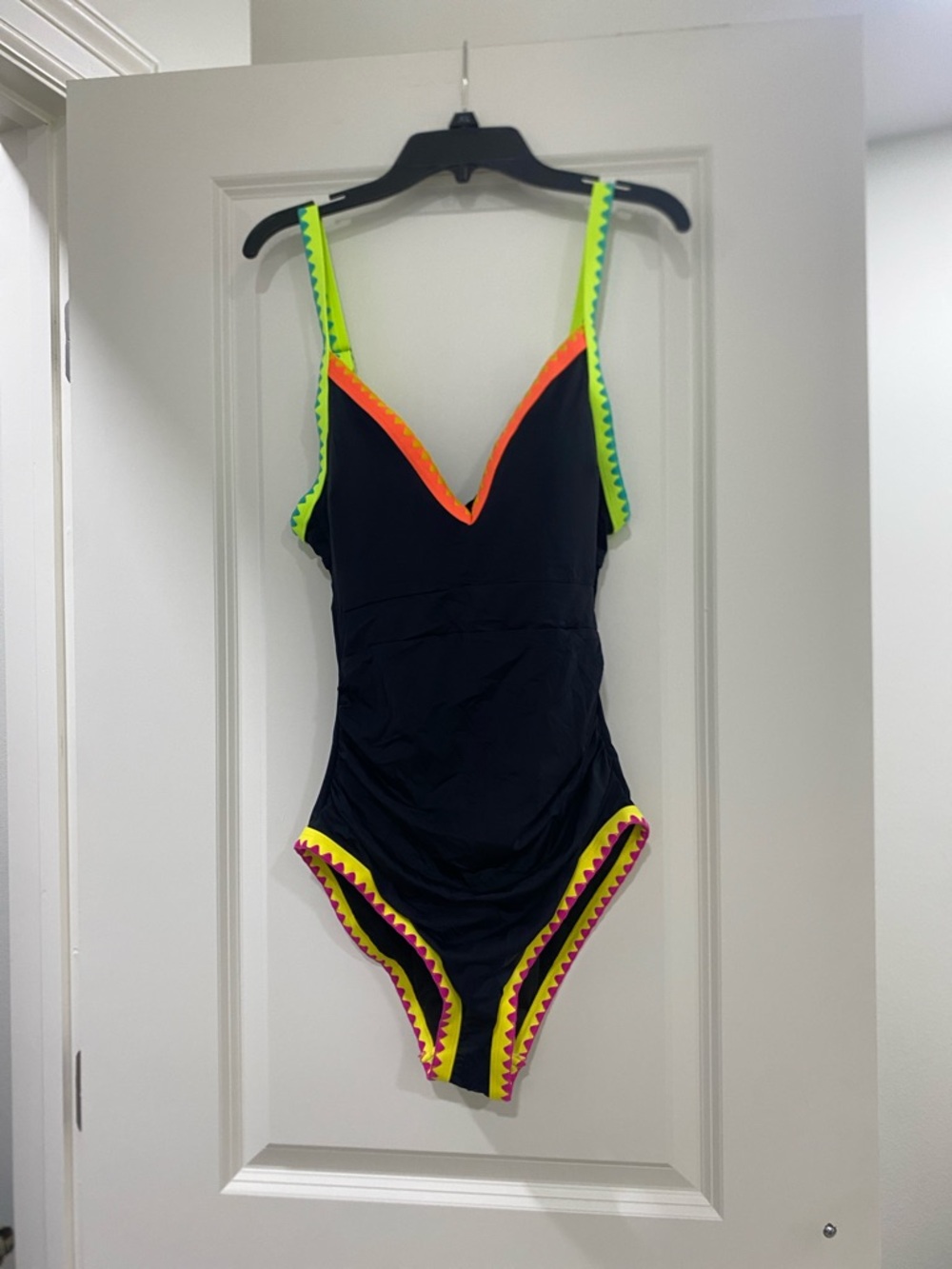 Black One-Piece Swimsuit with Neon Zigzag Trim